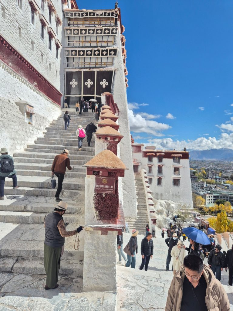 Climbing the steps of Potala Palace