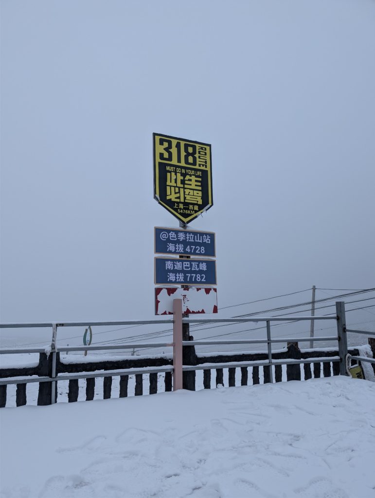 Snow-covered Sejila Scenic Area in autumn