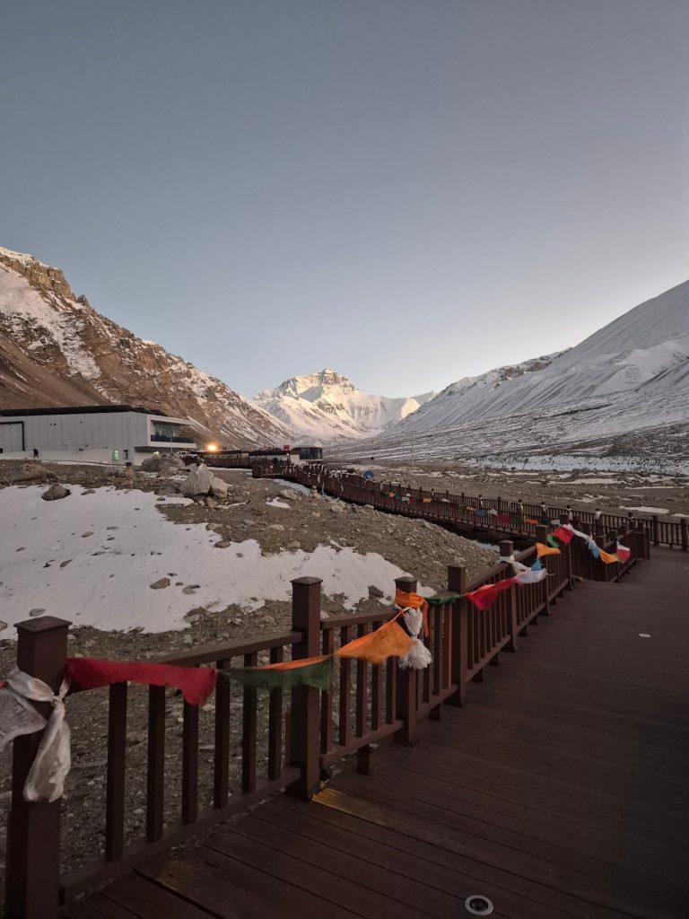 Wooden boardwalk at Everest Base Camp with strong winds