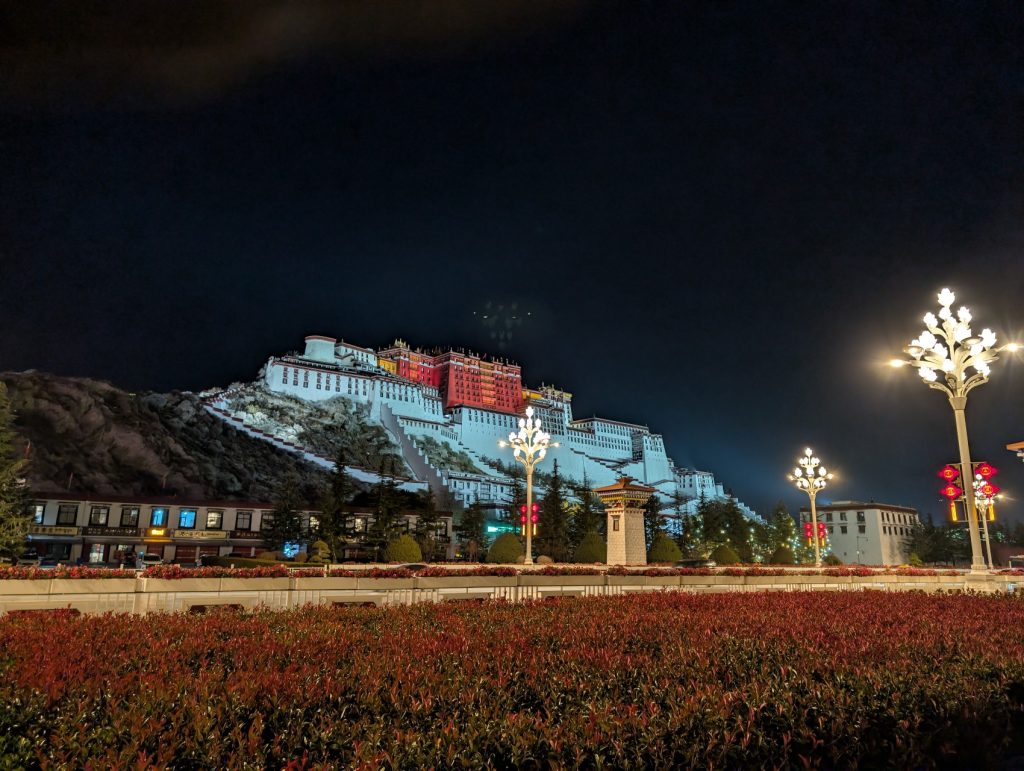 Potala Palace illuminated at night from Potala Palace Square